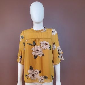 Women's medium polyester monteau dress shirt blouse, mustard floral.